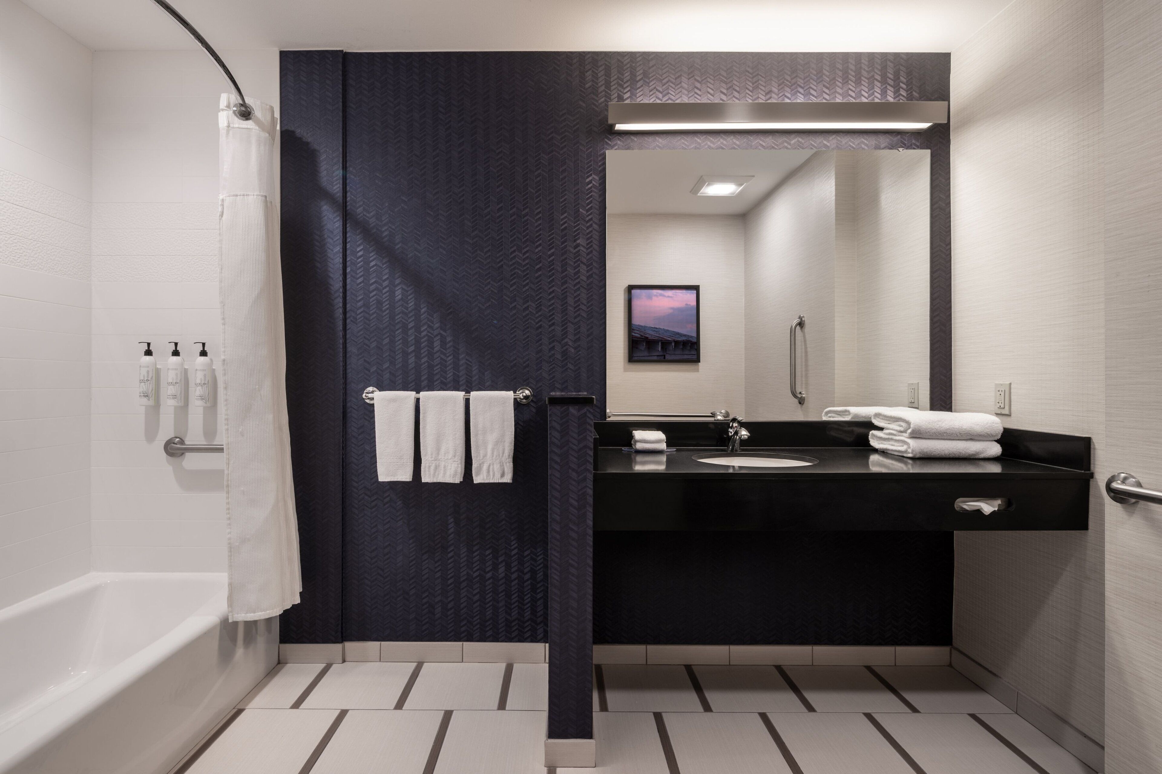 room, 2 queen beds | bathroom | free toiletries, hair dryer, towels, soap