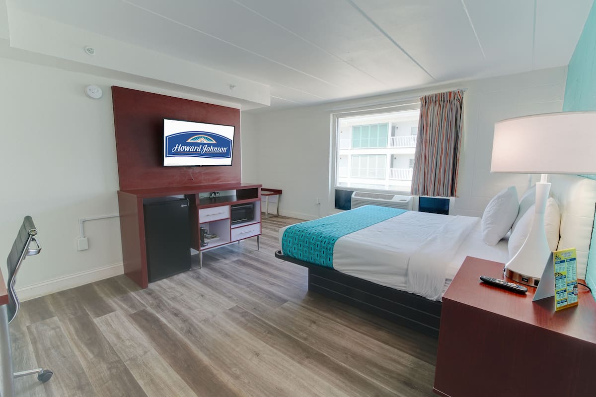 Habitación, 1 cama de matrimonio grande, no fumadores | Escritorio, espacio para trabajar con un portátil, cortinas opacas