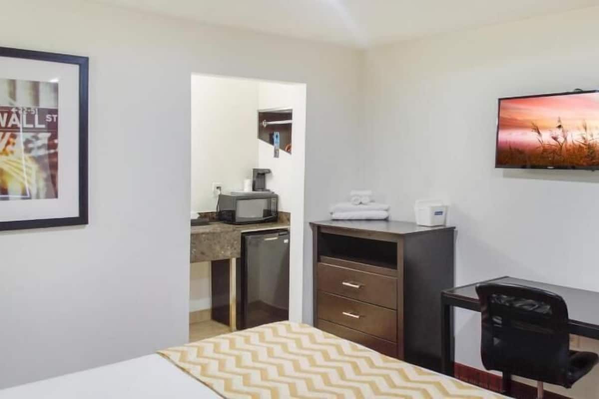 Desk, soundproofing, iron/ironing board, free cribs/infant beds