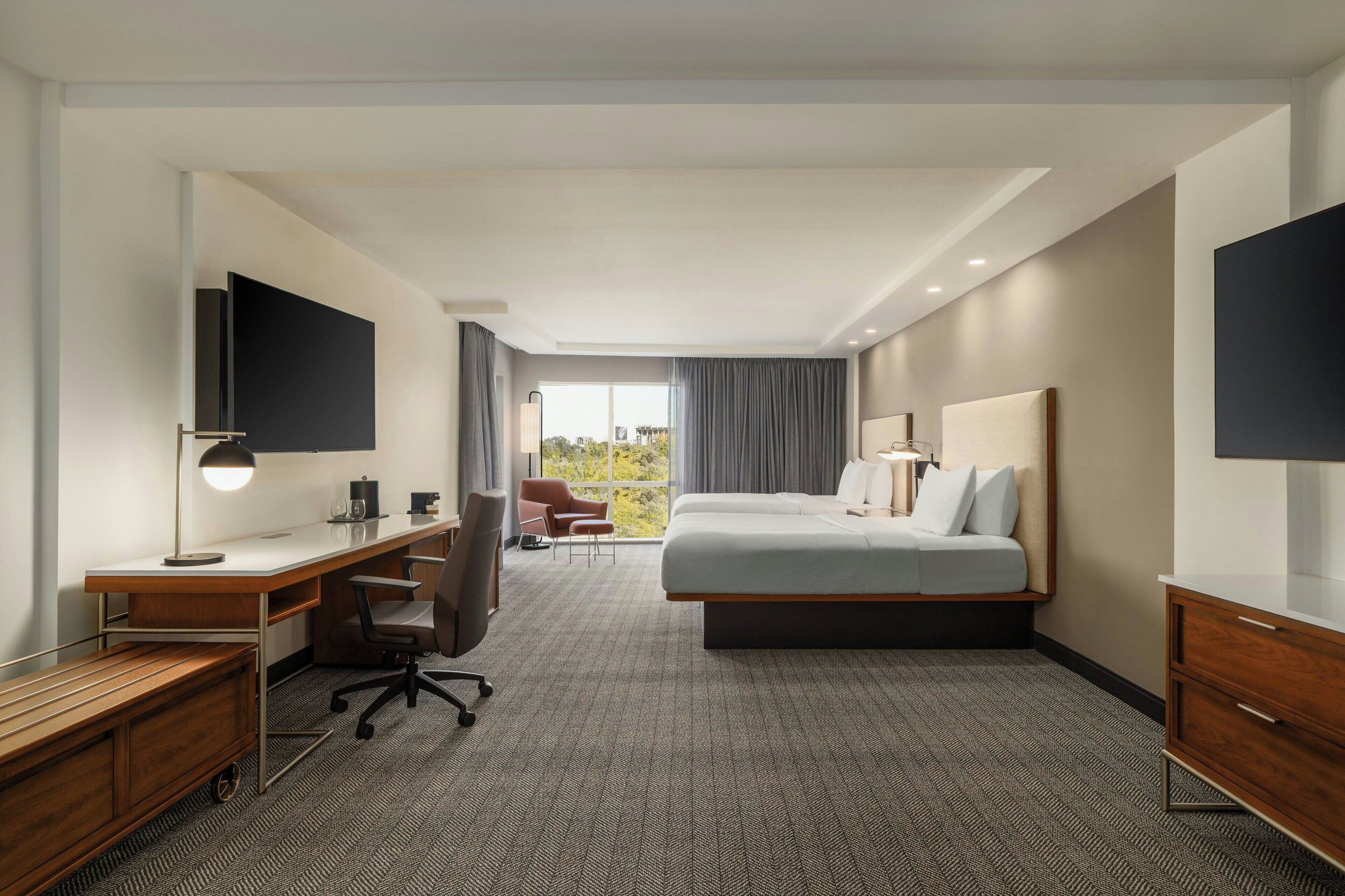 Desk, blackout curtains, iron/ironing board, free rollaway beds