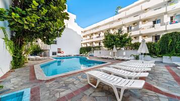 Outdoor pool, pool umbrellas, pool loungers