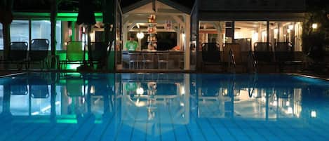 Seasonal outdoor pool, pool umbrellas, pool loungers