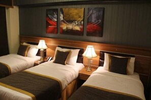 Classic Triple Room | Minibar, in-room safe, soundproofing, free WiFi