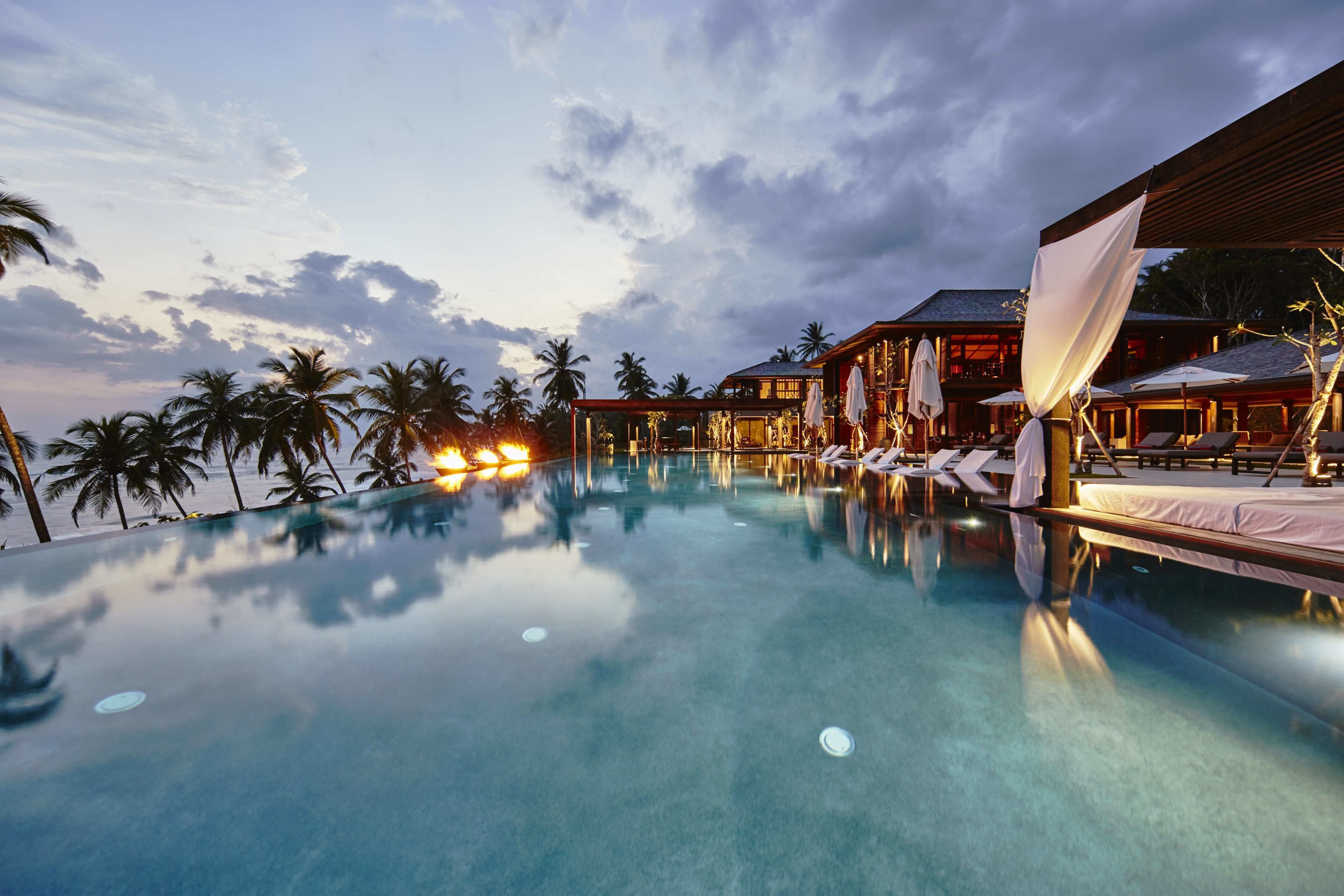 2 outdoor pools, pool umbrellas, pool loungers