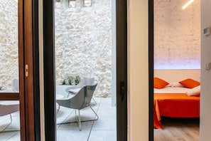 Deluxe Apartment, 2 Bedrooms, Patio | Living room | Flat-screen TV - Apartamentos Tito San Nicolás (Alicante)