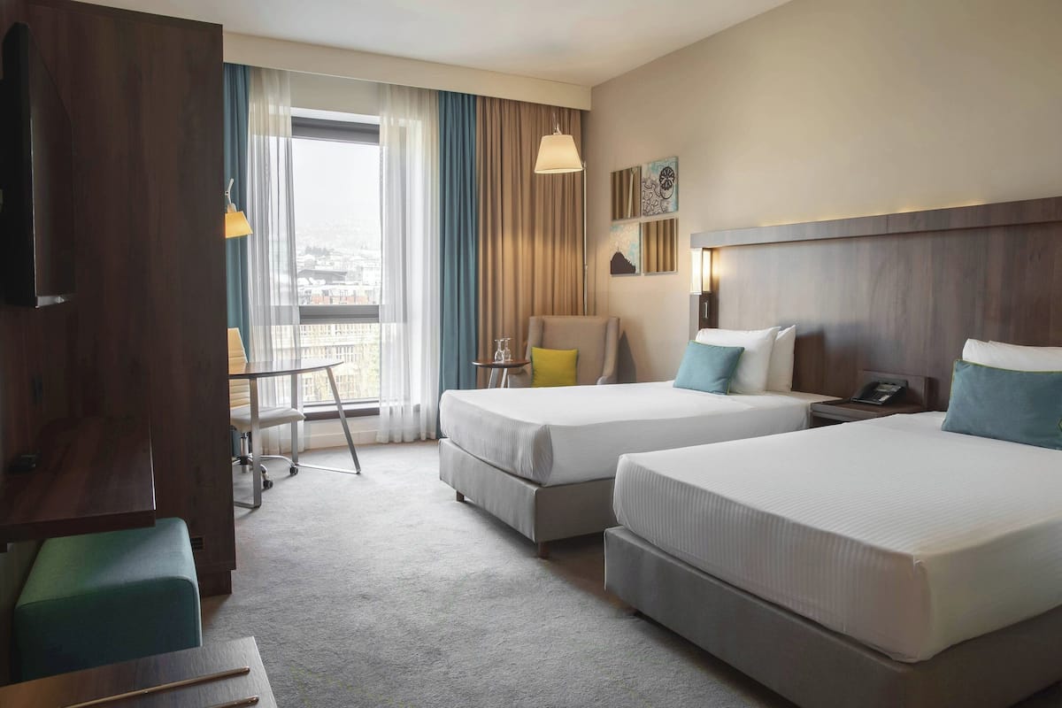 twin room, 2 single beds | premium bedding, pillow-top beds, in-room safe, desk