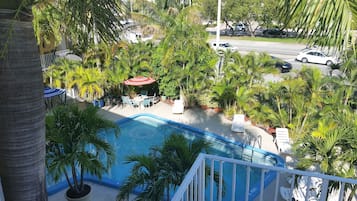 Outdoor pool, pool umbrellas, pool loungers