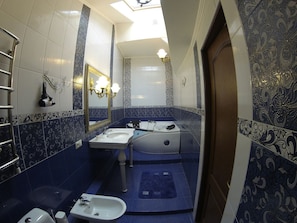 Suite, Jetted Tub | Bathroom | Free toiletries, hair dryer