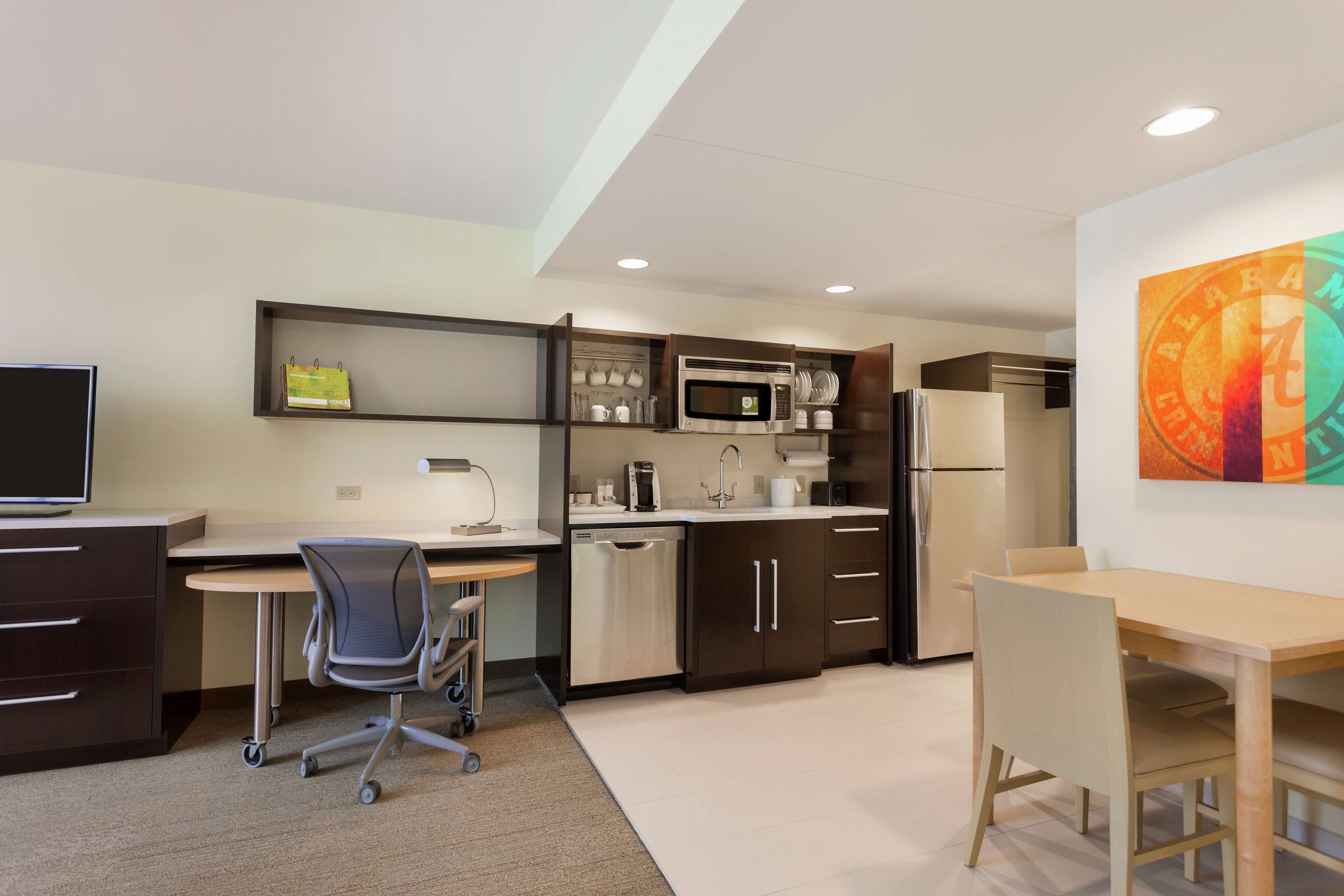 full-sized fridge, microwave, dishwasher, coffee/tea maker