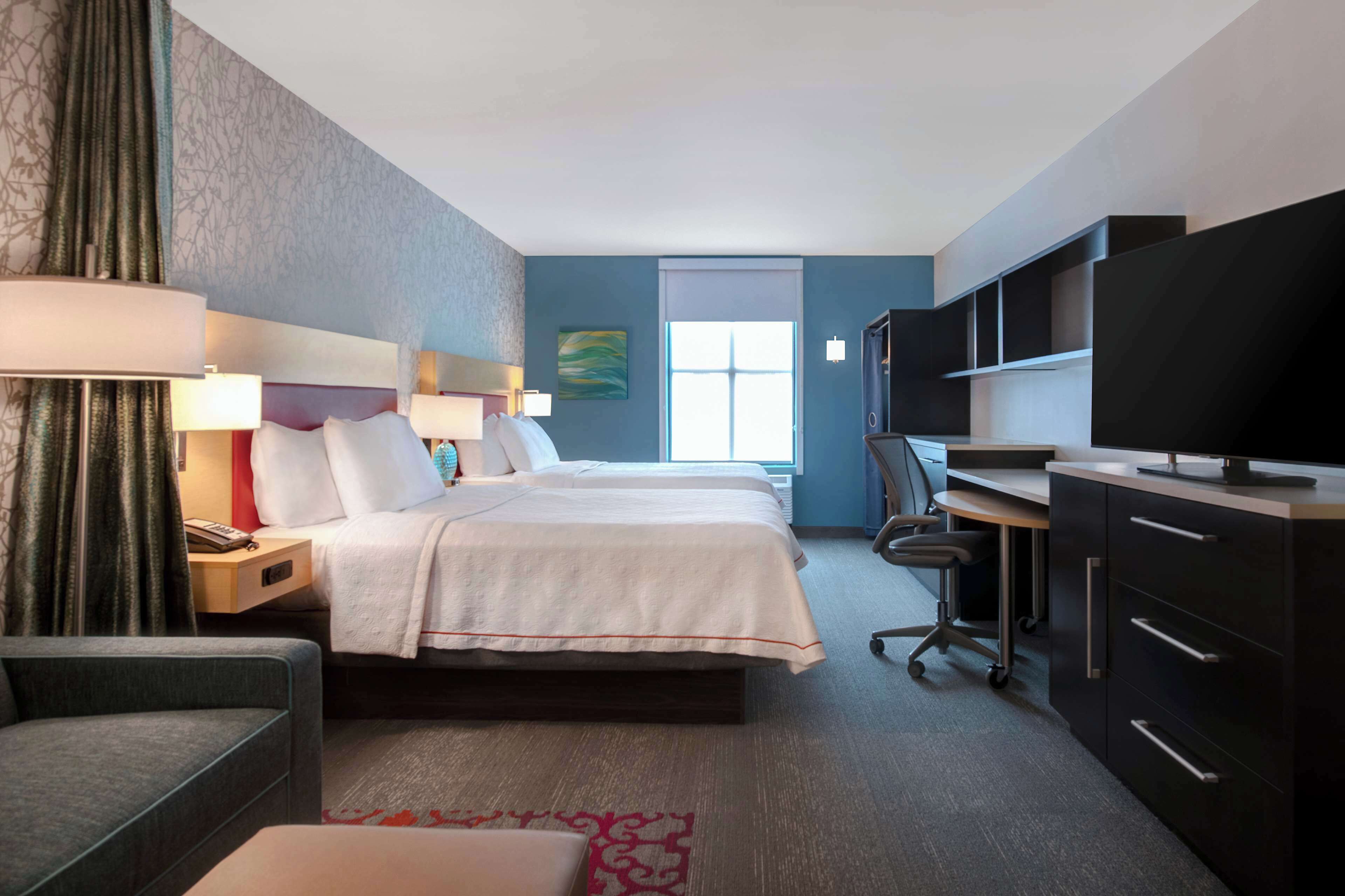 desk, laptop workspace, blackout curtains, iron/ironing board