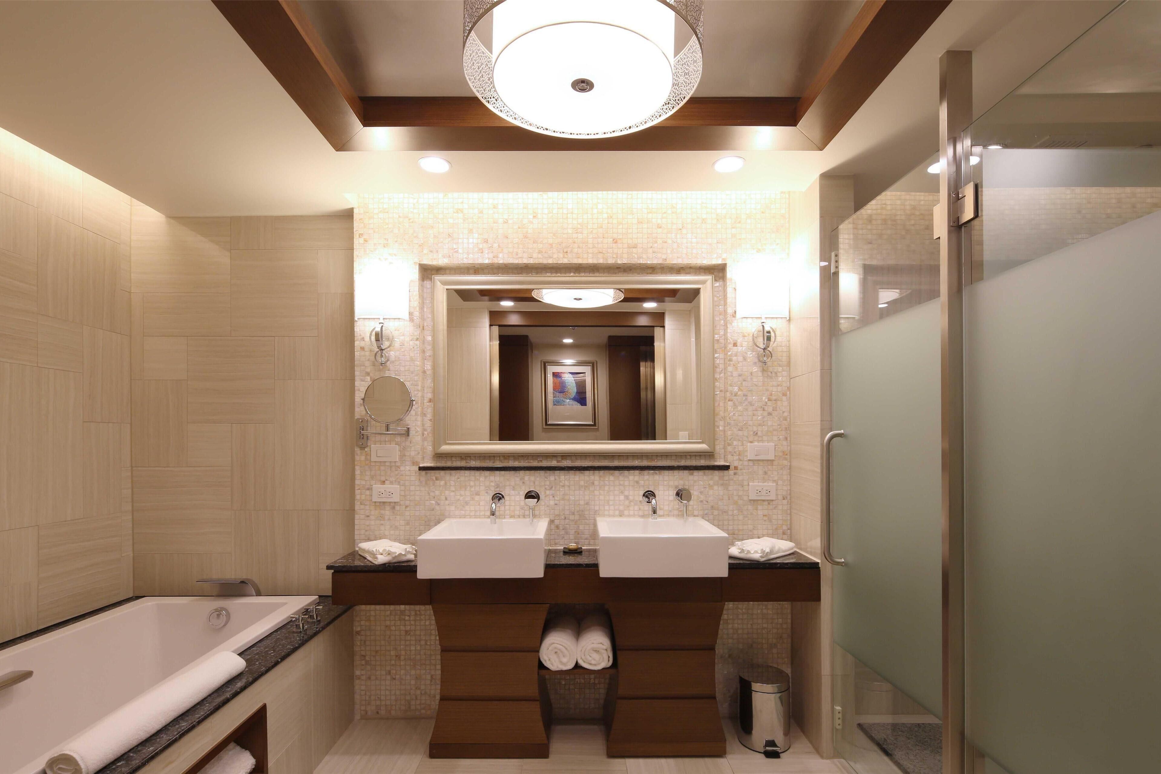 separate bathtub and shower, deep-soaking bathtub, rainfall showerhead