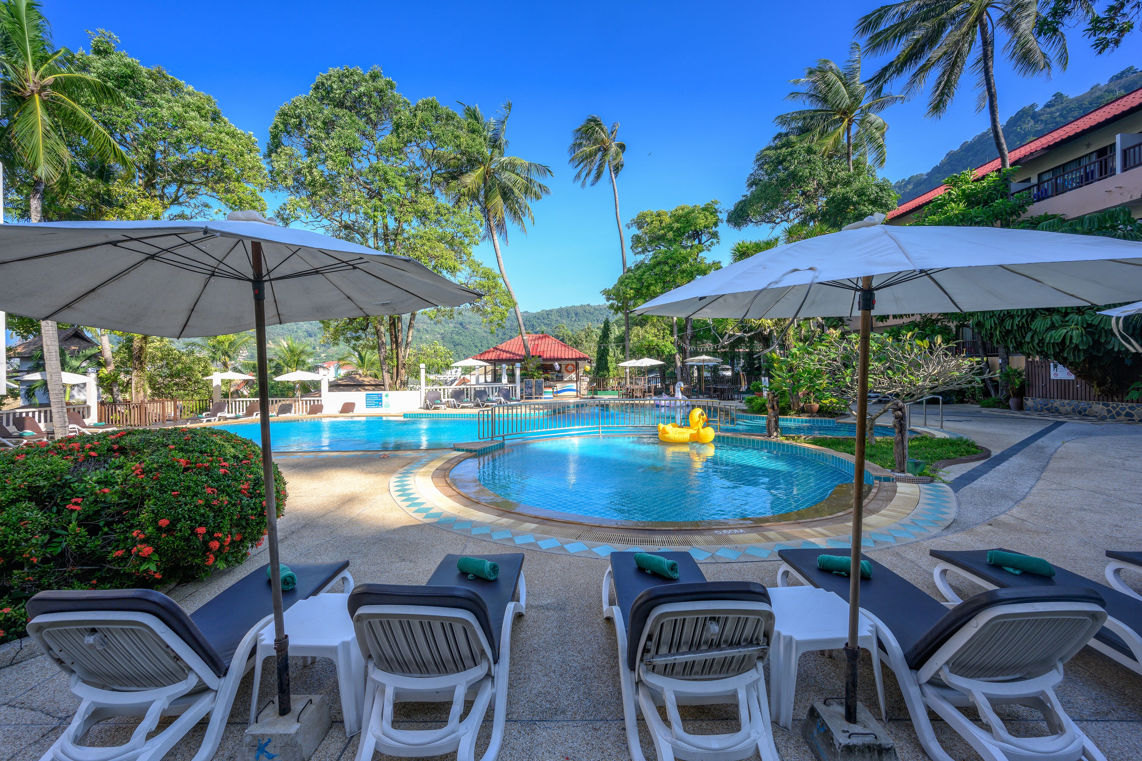 2 outdoor pools, open 10:00 AM to 8:00 PM, pool umbrellas, sun loungers