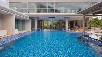 Indoor pool, outdoor pool, pool umbrellas, sun loungers