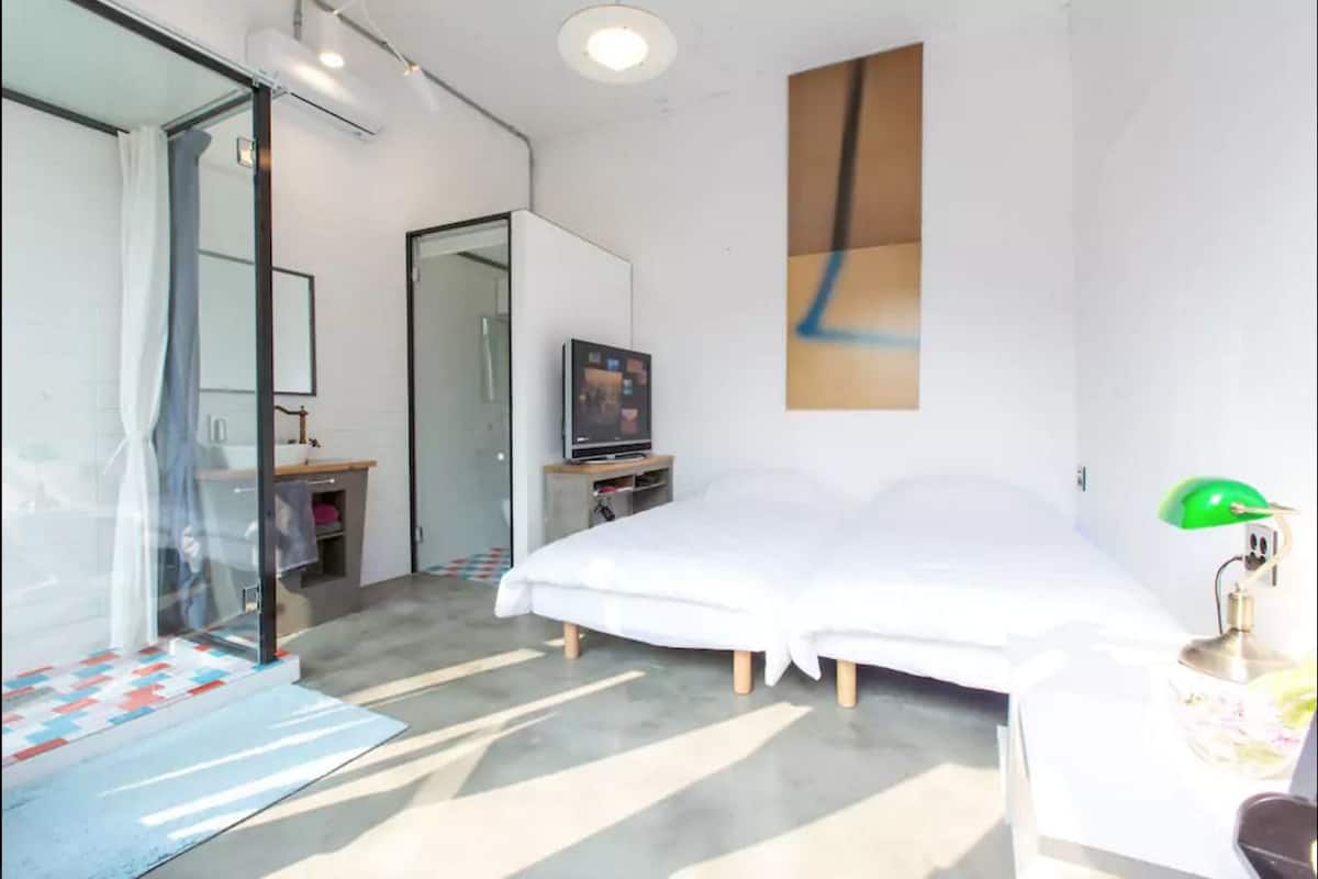 Twin Room | Blackout drapes, WiFi (free), bed sheets
