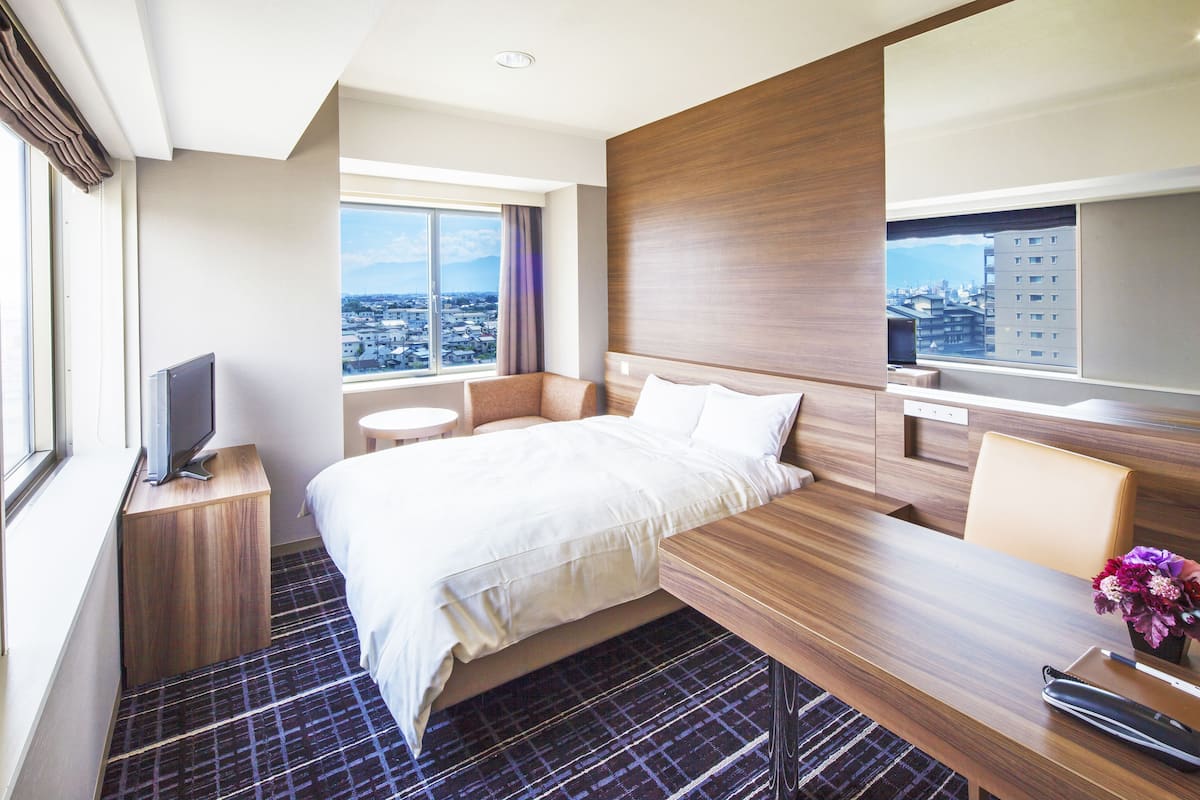 in-room safe, desk, blackout curtains, iron/ironing board