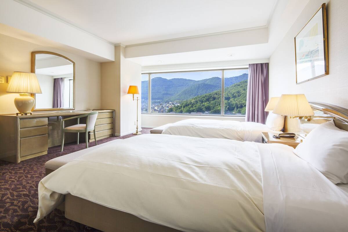 in-room safe, desk, blackout curtains, iron/ironing board