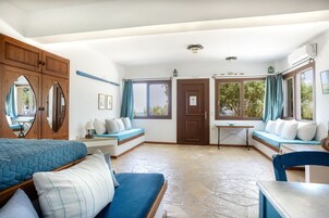 Studio, Sea View | Living area | Flat-screen TV