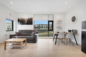 Blue Mountain Apartments- Family Studio | Living area | LED TV