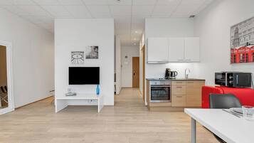 Blue Mountain Apartments- Family Studio | Living area | LED TV