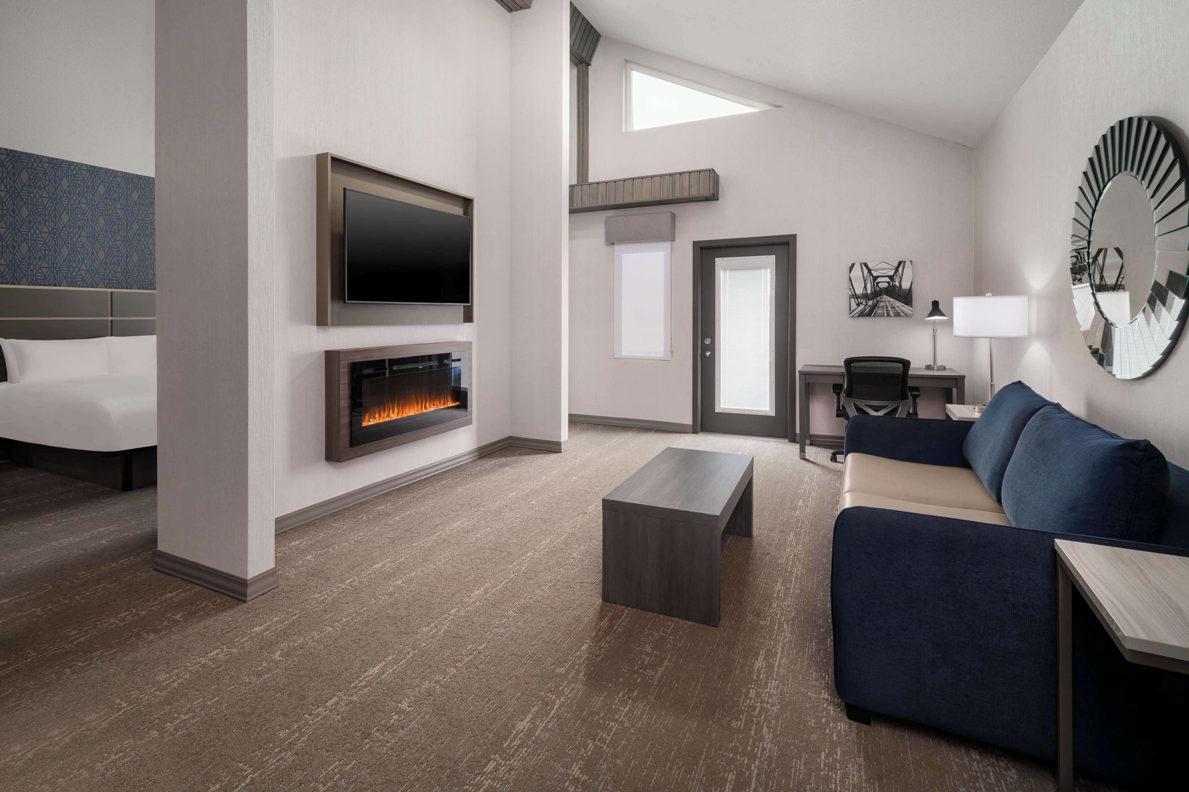 suite, 1 king bed, non smoking, balcony (with sofabed) | premium bedding, desk, laptop workspace, blackout curtains