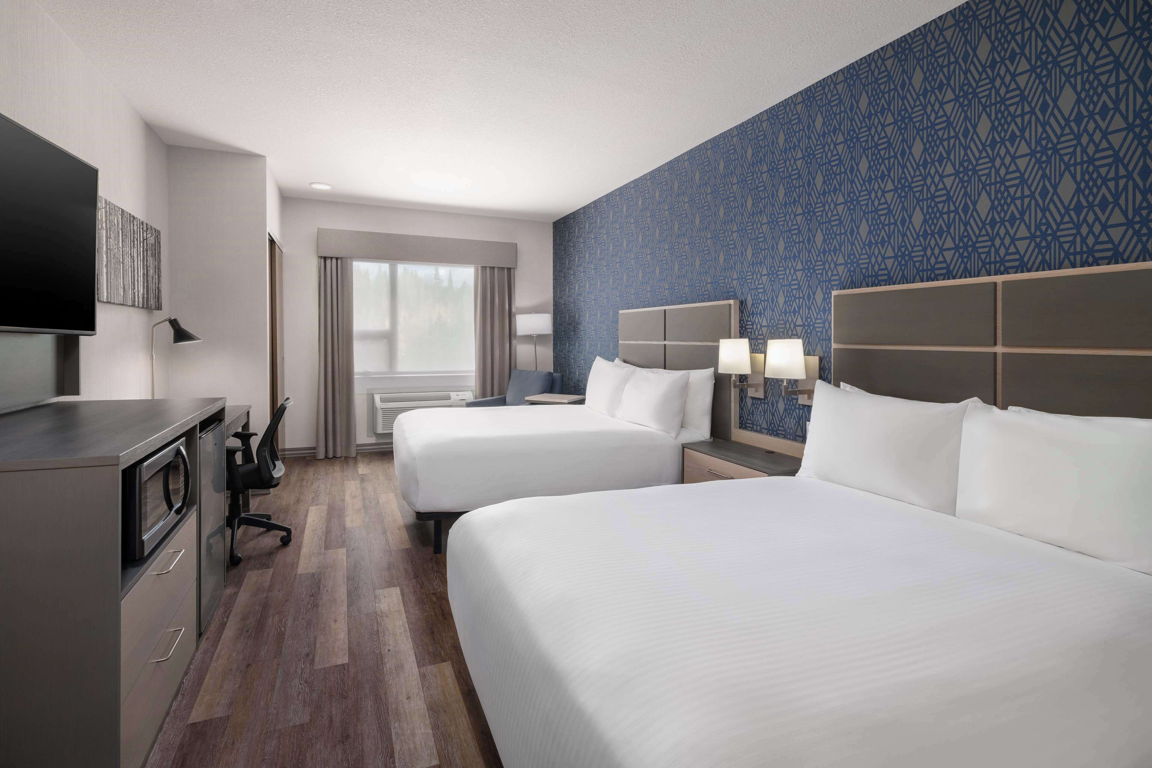 premium bedding, desk, laptop workspace, blackout curtains