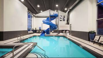 Indoor pool, open 6:00 AM to 10:00 PM, pool loungers