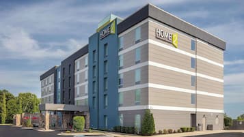 Home 2 offers a contemporary hotel experience with a variety of rooms and city views.