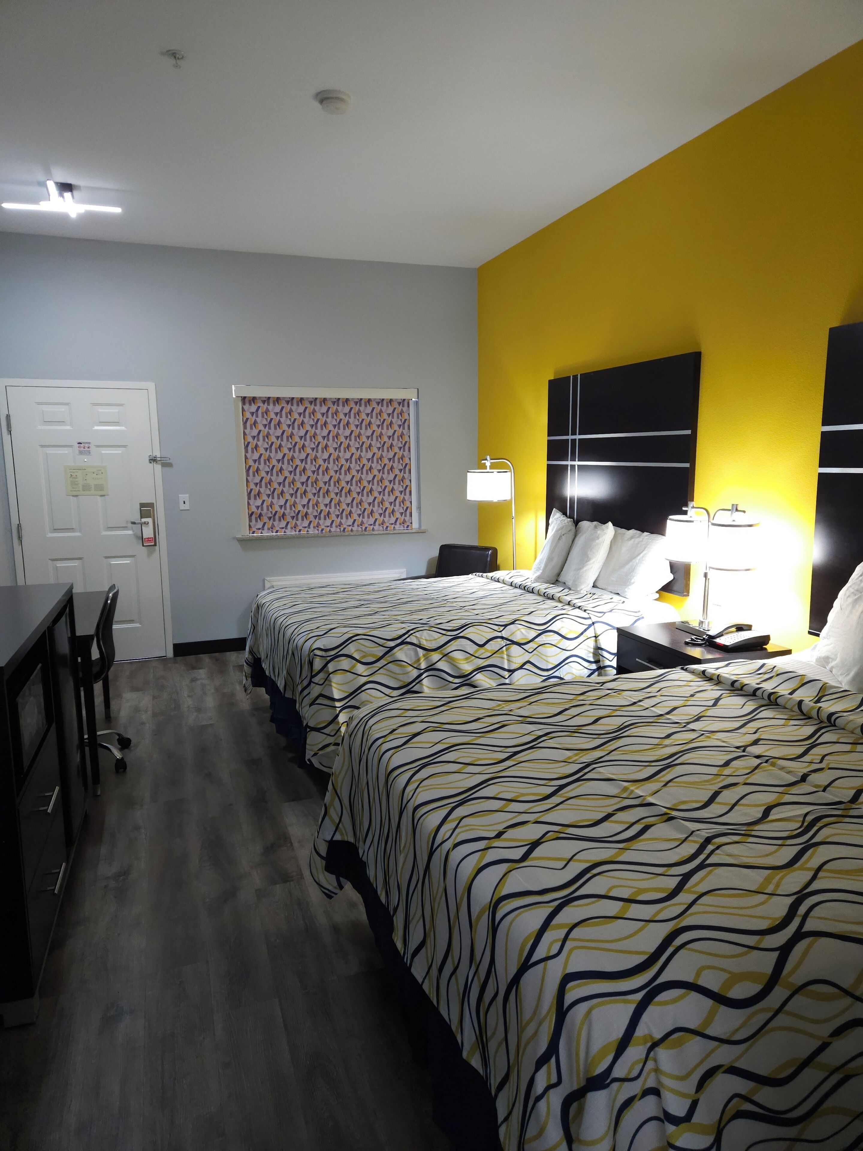 premium bedding, desk, iron/ironing board, rollaway beds