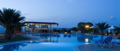 Outdoor pool, pool umbrellas, pool loungers