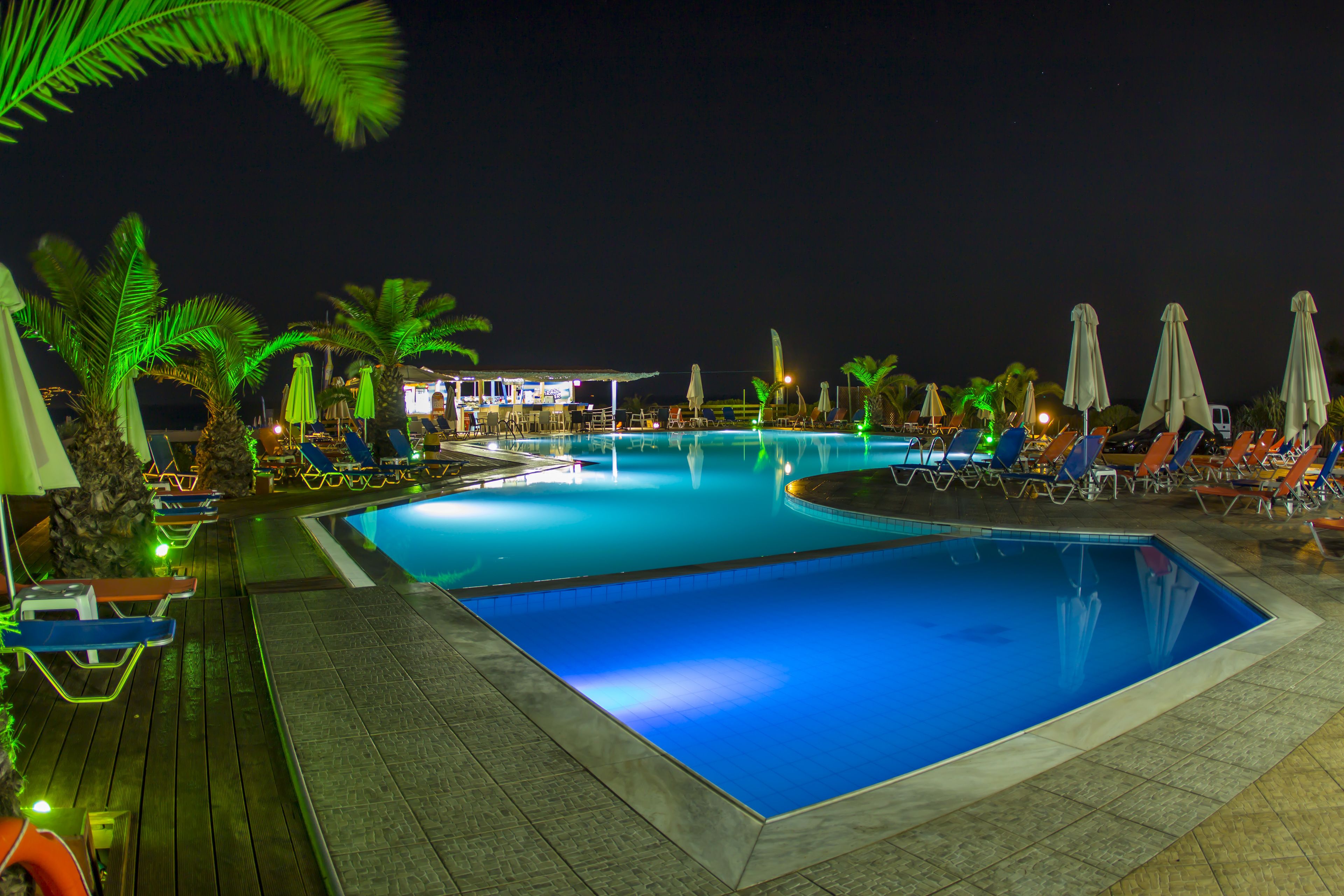 outdoor pool, pool umbrellas, pool loungers