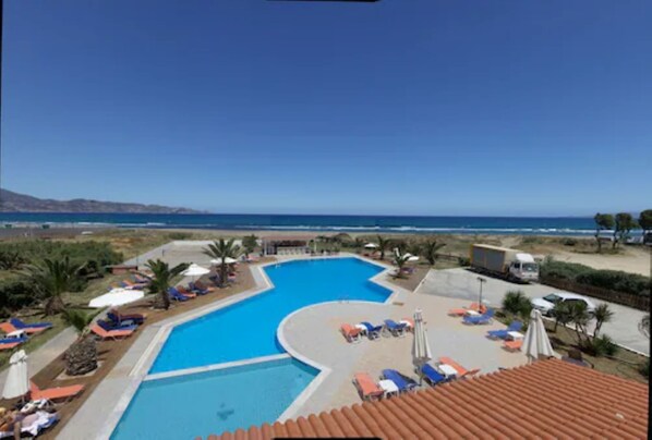 Outdoor pool, pool umbrellas, pool loungers