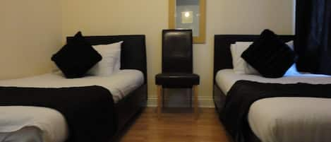 Blackout curtains, iron/ironing board, free WiFi, bed sheets