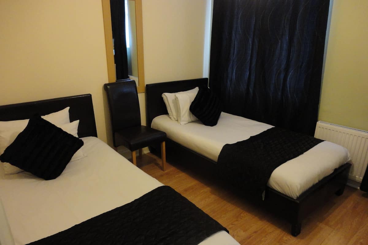 Blackout drapes, iron/ironing board, free WiFi, bed sheets