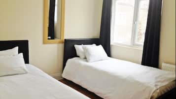 Basic Twin Room | Blackout curtains, iron/ironing board, free WiFi, bed sheets