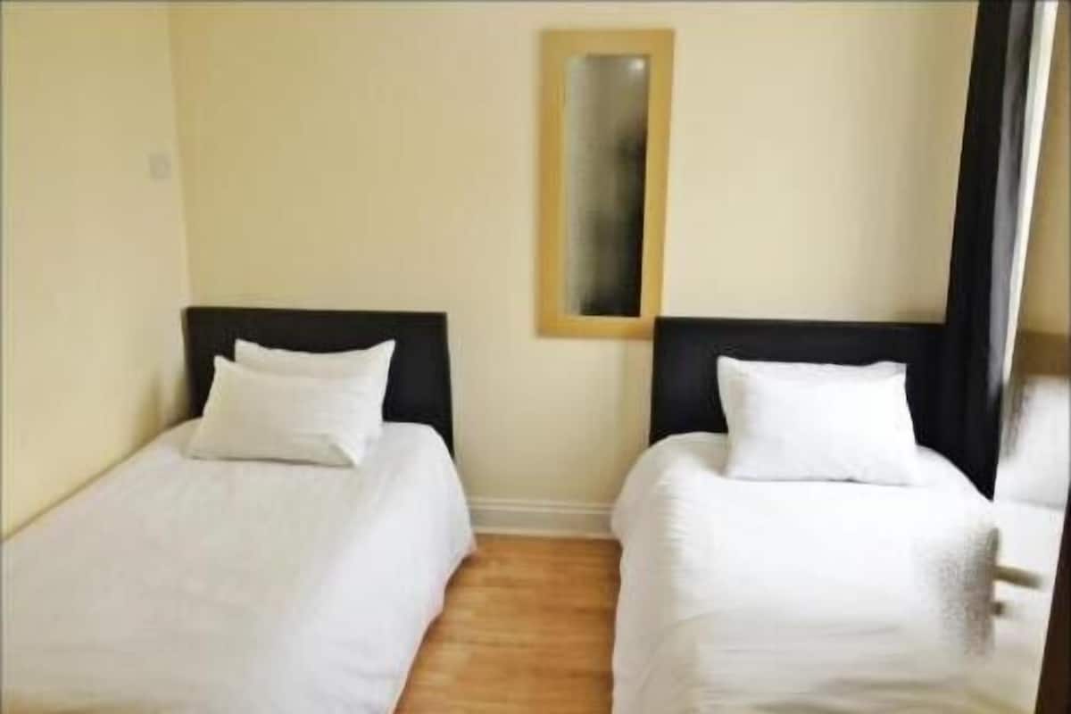 Blackout drapes, iron/ironing board, free WiFi, bed sheets