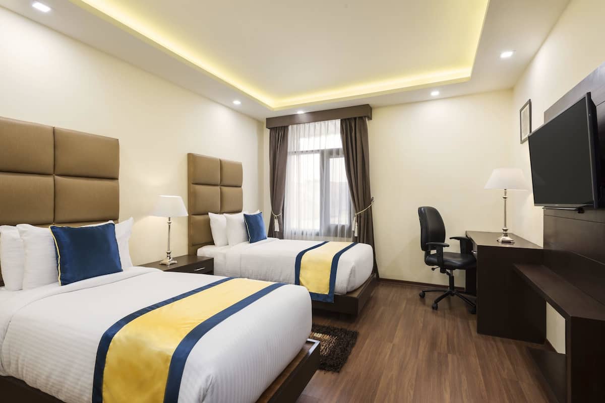 Egyptian cotton sheets, premium bedding, minibar, in-room safe