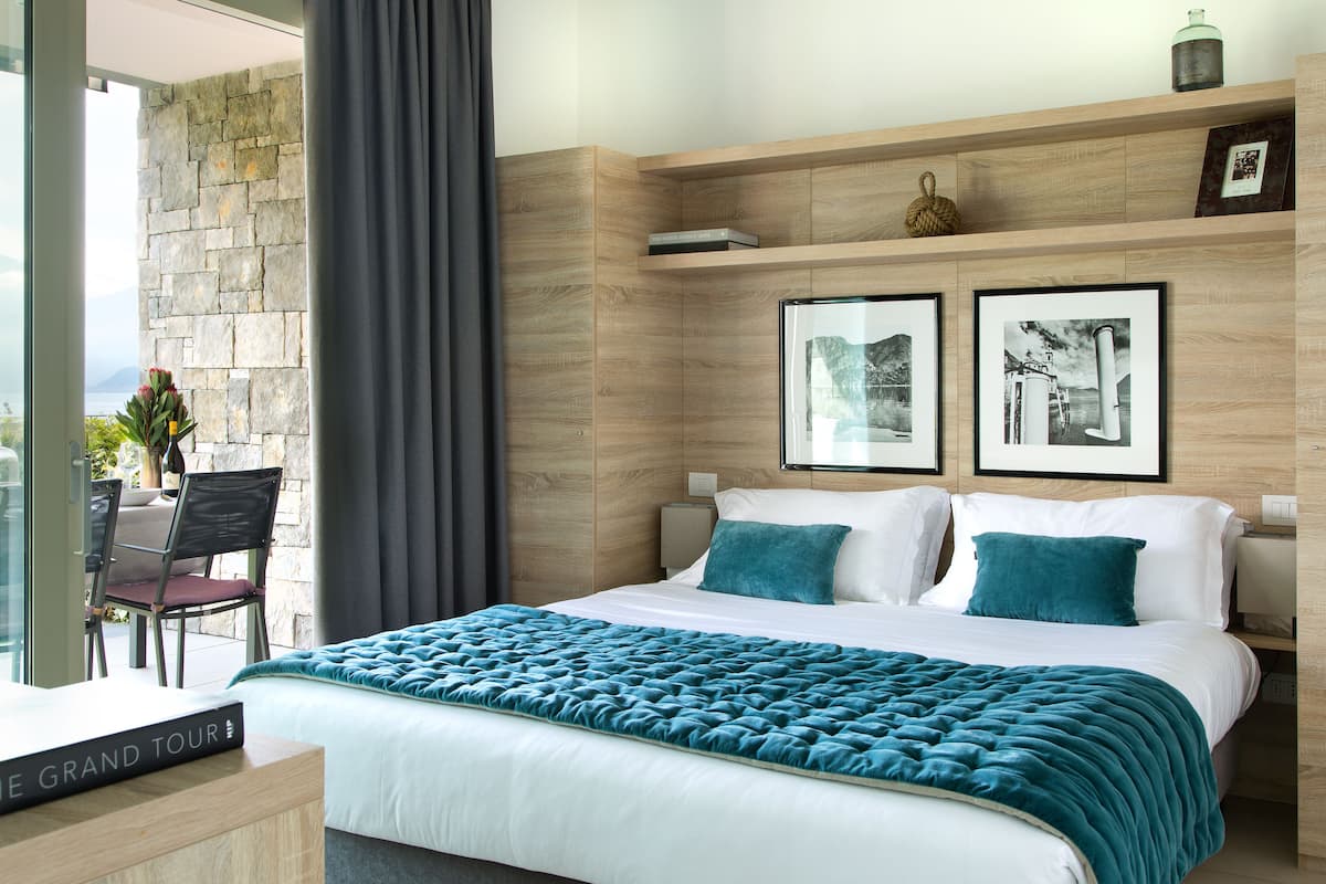 Appartement, 1 slaapkamer, uitzicht op meer | Italiaanse Frette-lakens, luxe beddengoed, een kluis op de kamer