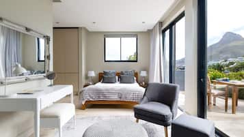Superior Suite, Partial Ocean View | Bathroom | Shower, designer toiletries, hair dryer, bathrobes