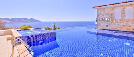 Outdoor pool, pool umbrellas, pool loungers