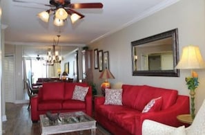 Standard Condo, 3 Bedrooms, 2 Bathrooms, Ocean View (1505) | Living room | TV - White Caps by Sugar Sands Realty (Orange Beach)