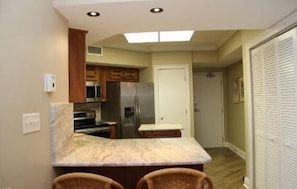 Standard Condo, 3 Bedrooms, 2 Bathrooms, Ocean View (1505) | Private kitchen | Full-sized fridge, microwave, stovetop, dishwasher - White Caps by Sugar Sands Realty (Orange Beach)