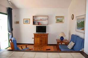 Apartment, 1 Bedroom | Living area | Flat-screen TV