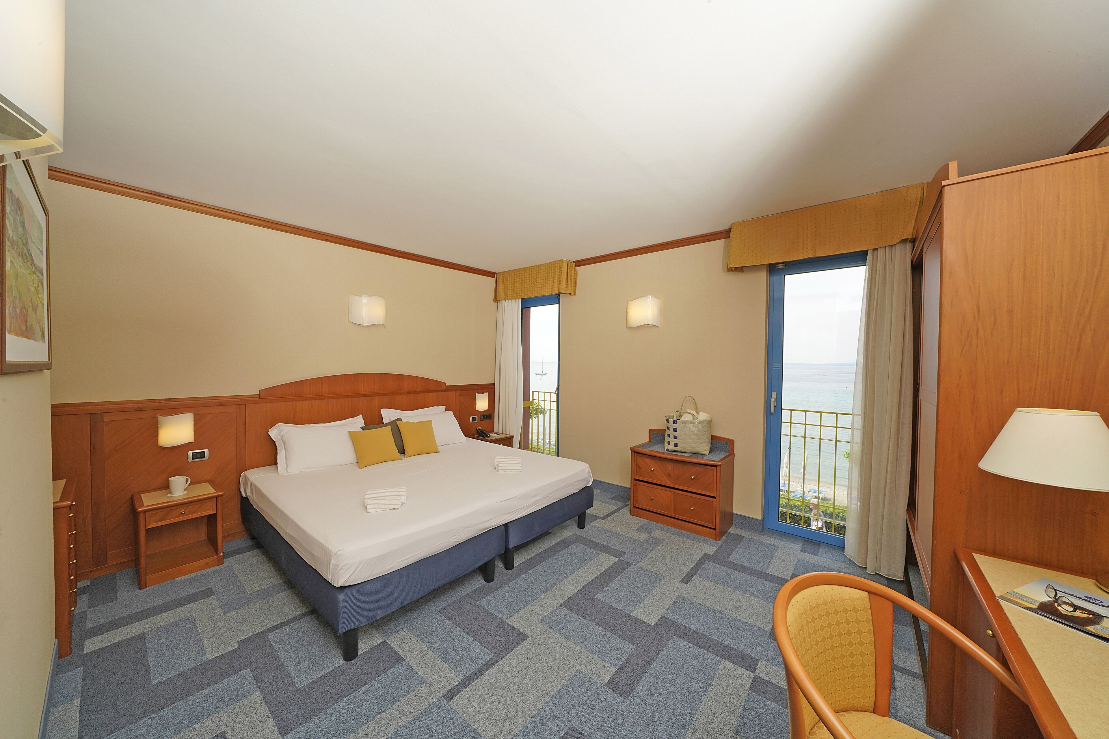 comfort double room, multiple beds, lakeside | minibar, in-room safe, soundproofing, free cots/infant beds