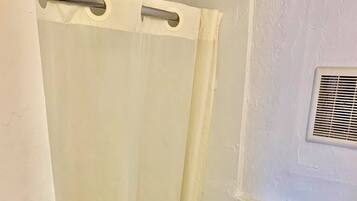 Economy Room, 1 Queen Bed, Refrigerator & Microwave, City View | Bathroom shower