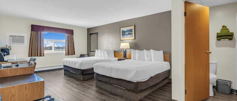 Ropa de cama de alta calidad, colchones con acolchado adicional, minibar