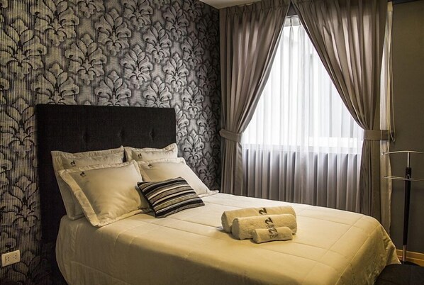 Chambre simple | Décor unique, bureau, accès au Wi-Fi (inclus), literie fournie