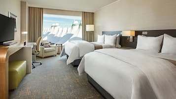 Premium bedding, down comforters, pillowtop beds, in-room safe