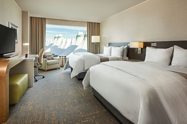 Premium bedding, down comforters, pillowtop beds, in-room safe