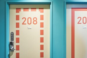 Premium bedding, desk, soundproofing, free cots/infant beds