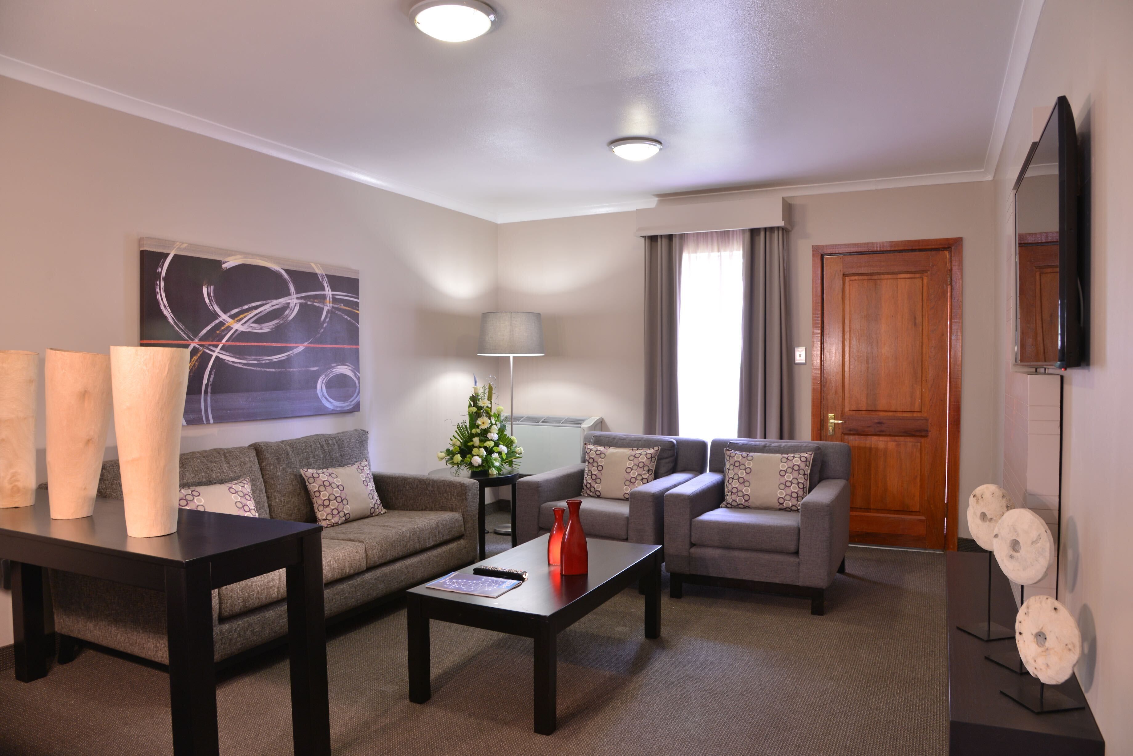 business suite, 1 bedroom, kitchenette, courtyard area (silverbirch suite 4*) | living area | 32-inch flat-screen tv with satellite channels, tv